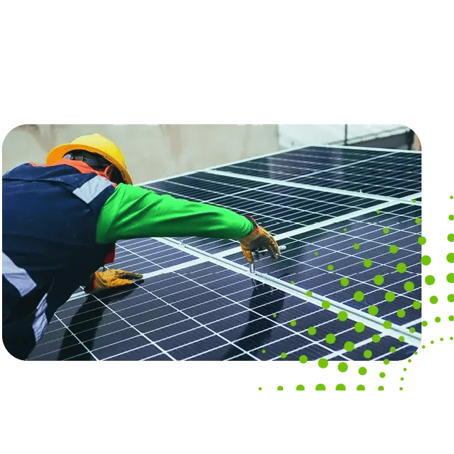A worker in a hard hat and gloves inspects solar panels on a roof, adjusting connections and ensuring proper installation. A worker in a hard hat and gloves inspects solar panels on a roof, adjusting connections and ensuring proper installation.